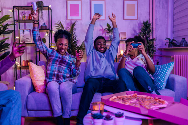 istock Friends playing video games at the apartment 1481212099