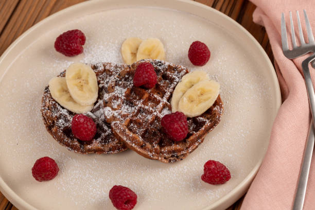 istock Cottage cheese and banana waffles with chocolate 1481212928