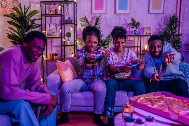 istock Friends playing video games at the apartment 1481214177
