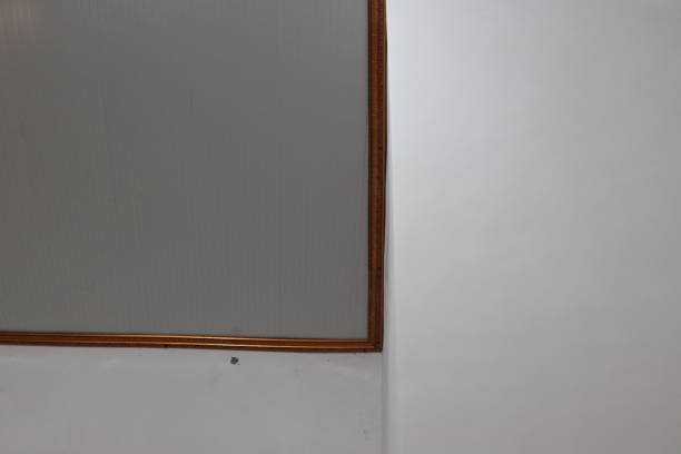 istock white ceiling with gold colored elbows and sides 1481216077