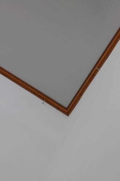 istock white ceiling with gold colored elbows and sides 1481216269