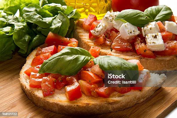Italian Bruschetta Stock Photo - Download Image Now - Appetizer, Basil, Bread