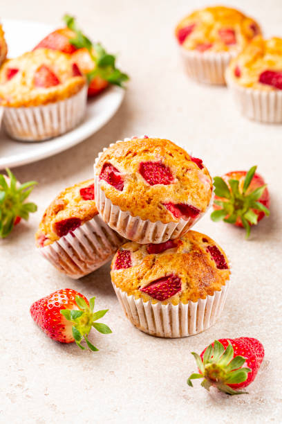 istock Strawberry banana muffins. Fruit homemade sweet pastry. Selective focus, vertical image. 1481220507