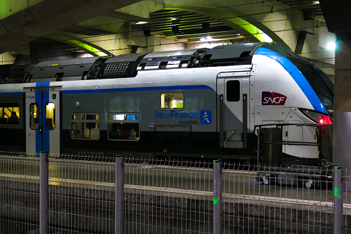 Paris, France. April 02. 2023. Train in Montparnasse station ready for departure. SNCF, Regional express train.