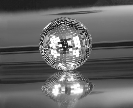 silver disco ball on a silver background