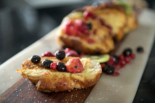 Tost with berry fruits, close up