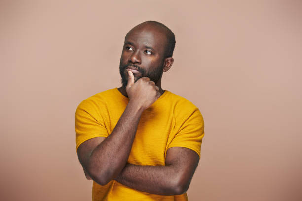African American man contemplating about something