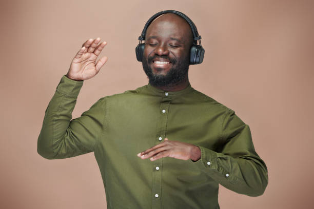 Man listening to music and dancing