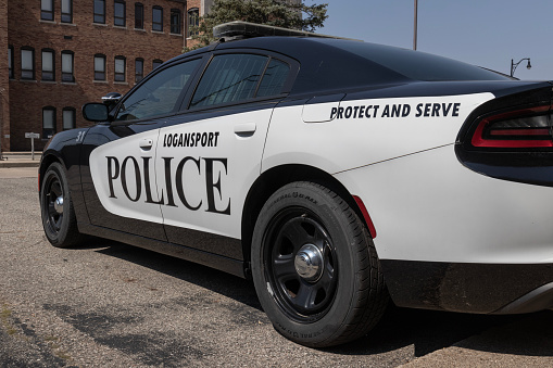 Logansport - Circa April 2023: Logansport police cars with the words Protect and Serve. The police have a duty to enforce the laws of its jurisdiction.