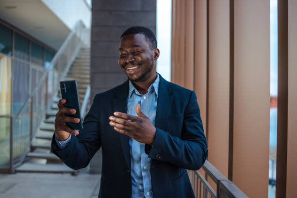 istock Cheerful African-American man on a video call 1481238675