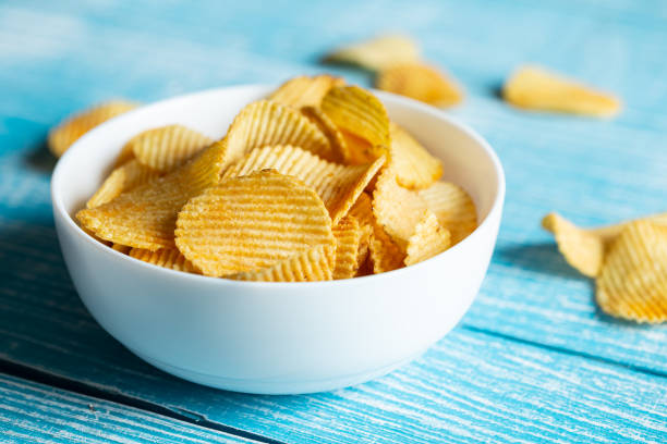 istock Close-up, a plate of potato chips on a blurred background. 1481239610