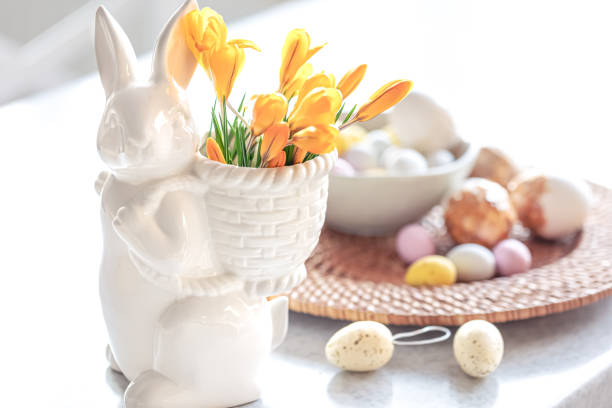 istock Easter still life with a ceramic hare, eggs and flowers. 1481239853