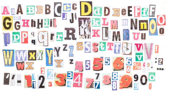 Loads of letters clipped from newspapers. There are several variants of each letter,  plus numerals and punctuation.