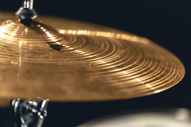 istock Drum cymbal close-up on a dark background. 1481241068