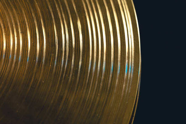 istock Drum cymbal close-up on a dark background, top view. 1481241081