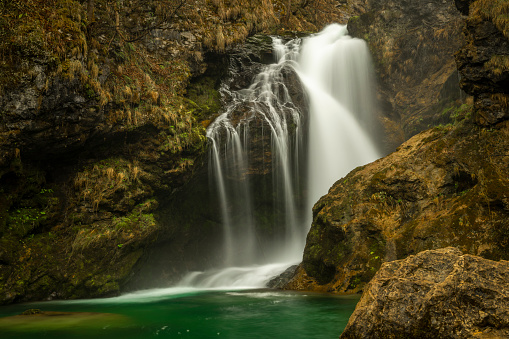 Sum waterfall on Radovna river in spring color fresh north Slovenia