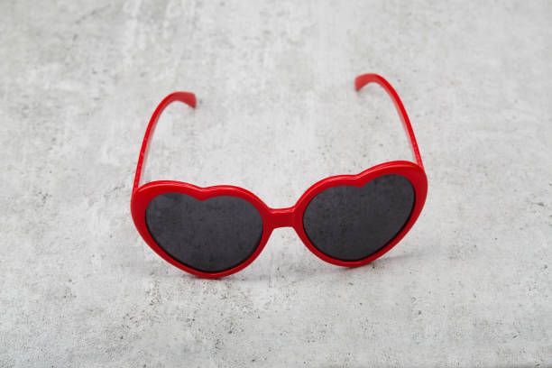 istock Red heart shape sunglasses on concrete background 1481242238