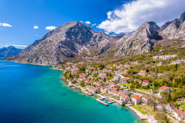 Scenic Boka Kotorska bay village of Donji Orahovac aerial view Scenic Boka Kotorska bay village of Donji Orahovac aerial view, archipelago of Montenegro kotor montenegro stock pictures, royalty-free photos & images