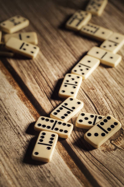 istock a group of domino blocks are laid out on a table 1481246808