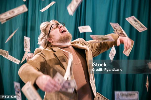 Retro Styled Man Celebrates In Falling Money Stock Photo - Download Image Now - Currency, Lottery, Winning