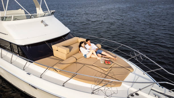 Young couple embracing on a yacht