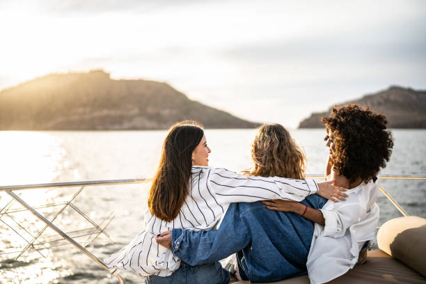 istock Young women embracing on a yacht trip 1481251721