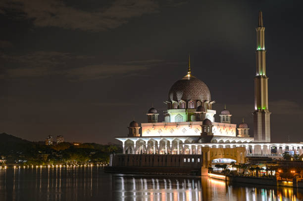 istock Islamic Mosque at Putrajaya in Malaysia with night time view and reflection 1481254531