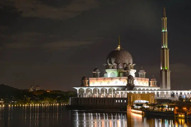 Photo of Islamic Mosque at Putrajaya in Malaysia with night time view and reflection
