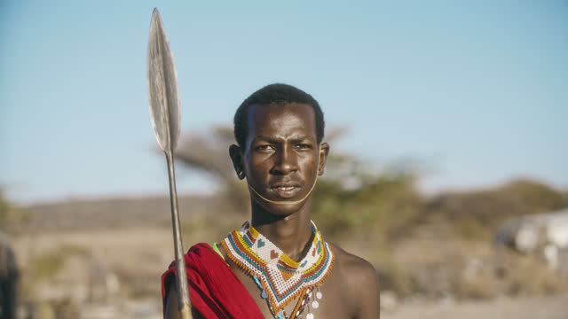 SLO MO Authentic Samburu warrior in traditional tribal clothing
