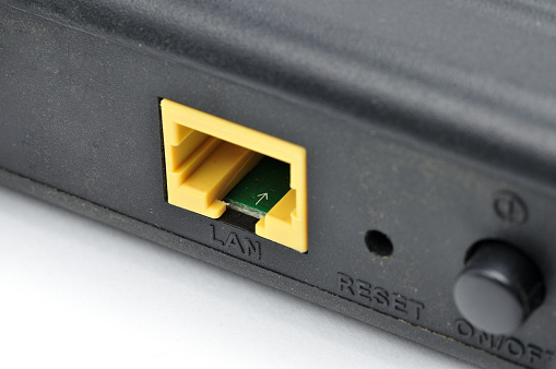 LAN cable with Registered Jack RJ45 plug on isolated white background