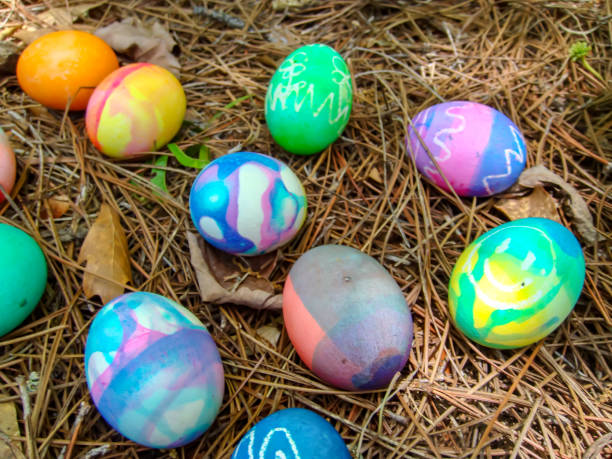 Dyed Easter Eggs Dyed Easter Eggs, Easter Egg Hunt easter egg coloring stock pictures, royalty-free photos & images