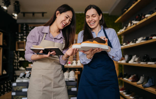 istock Women working in a shoe store 1481259961
