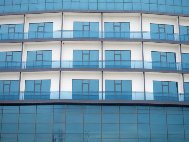 istock Facade of a modern blue house. New house. Windows pattern. Uninhabited housing. 1481265296