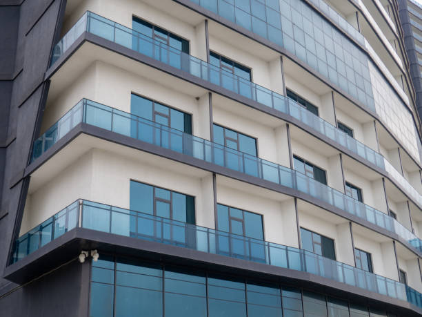 istock Facade of a modern blue house. New house. Windows pattern. Uninhabited housing. 1481265931
