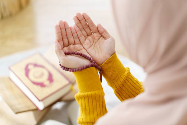 istock Muslim woman praying. 1481266112