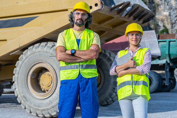 istock Portrait of road engineers at work, building highways. 1481267121