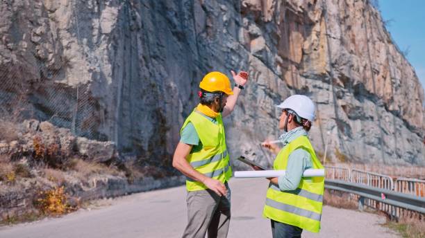 istock Road engineers work on the building of highways. 1481267129