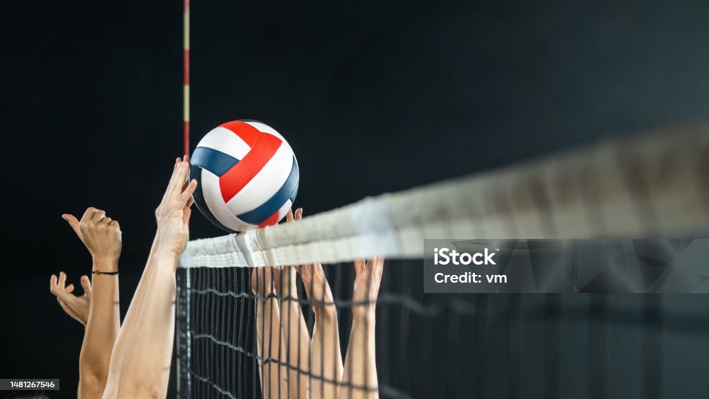 Volleyball Players Arms Hitting Ball Side View Stock Photo - Download ...