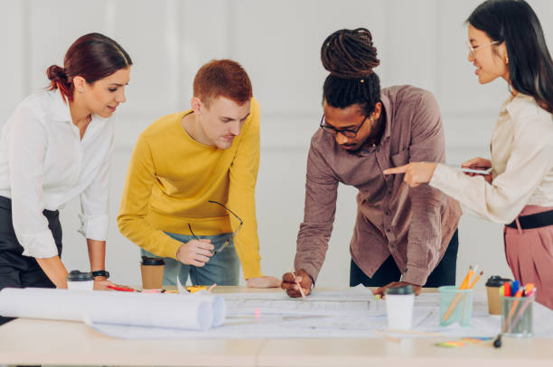 istock Multiracial team of engineers or architects having a meeting in an office 1481267919