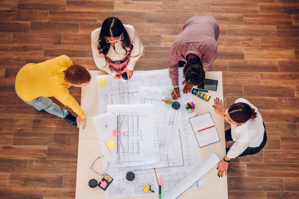 istock Diverse group of engineers or architects having a meeting in an office 1481267929