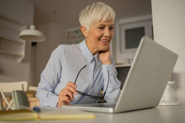 istock Senior woman working from home 1481275177