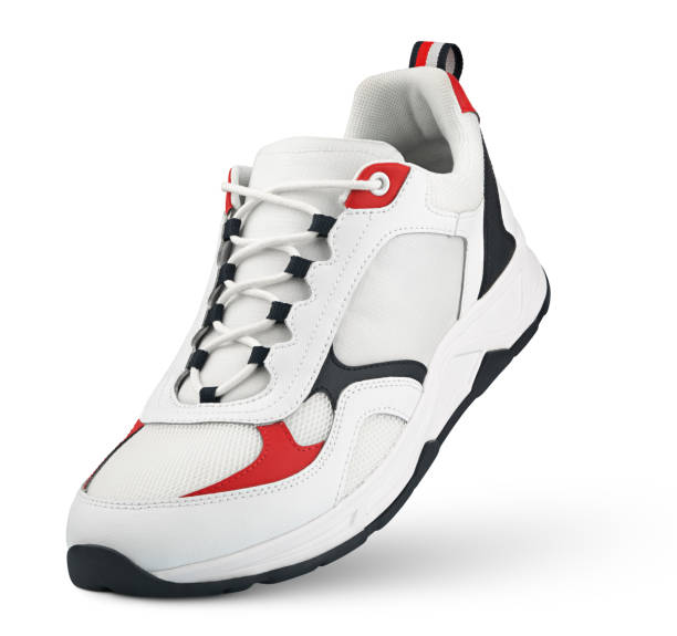 istock White sneaker stands on the tip isolated on white 1481275925