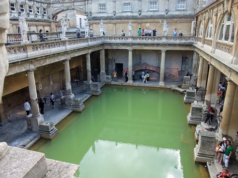 BATH, ENGLAND  August 4, 2010: Historic Roman Baths in the city of Bath