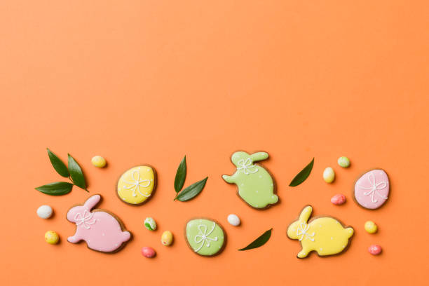 istock holiday preparation Multi colors Easter eggs with cookies on colored background . Pastel color Easter eggs. holiday concept with copy space 1481276547
