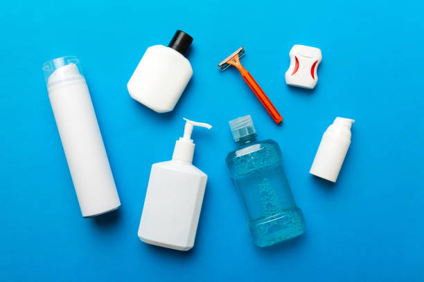istock Mockup for bathing products top view flat lay, spa razor, toothpaste, soap, gel and other various accessories. Cosmetics for skin health. Bath Mockup for your logo 1481276570