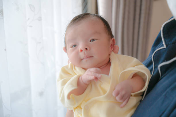 istock cute japanese baby with mother 1481279345