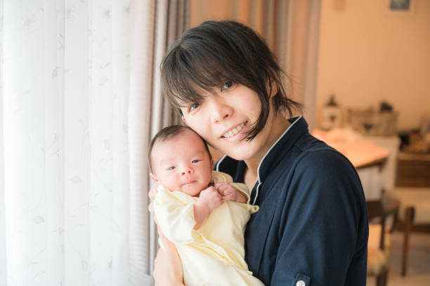 istock cute japanese baby with mother 1481279434