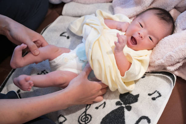 istock cute japanese baby with mother 1481280359