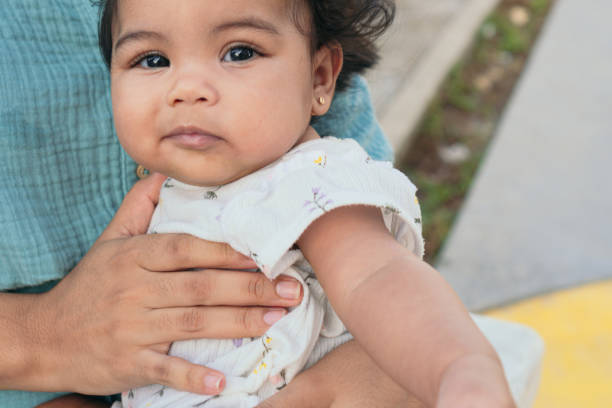 istock Latin Baby looking at camera outdoors 1481281032
