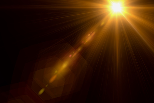 Digital sun rays light rendering isolated on the black background for overlay design or screen blending photo editing